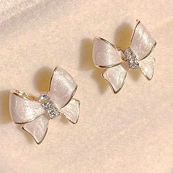 3/$20 Cream with Gold Tone Ribbon Bow Tie Enamel and CZ Stud Pierced Earrings - Picture 3 of 11